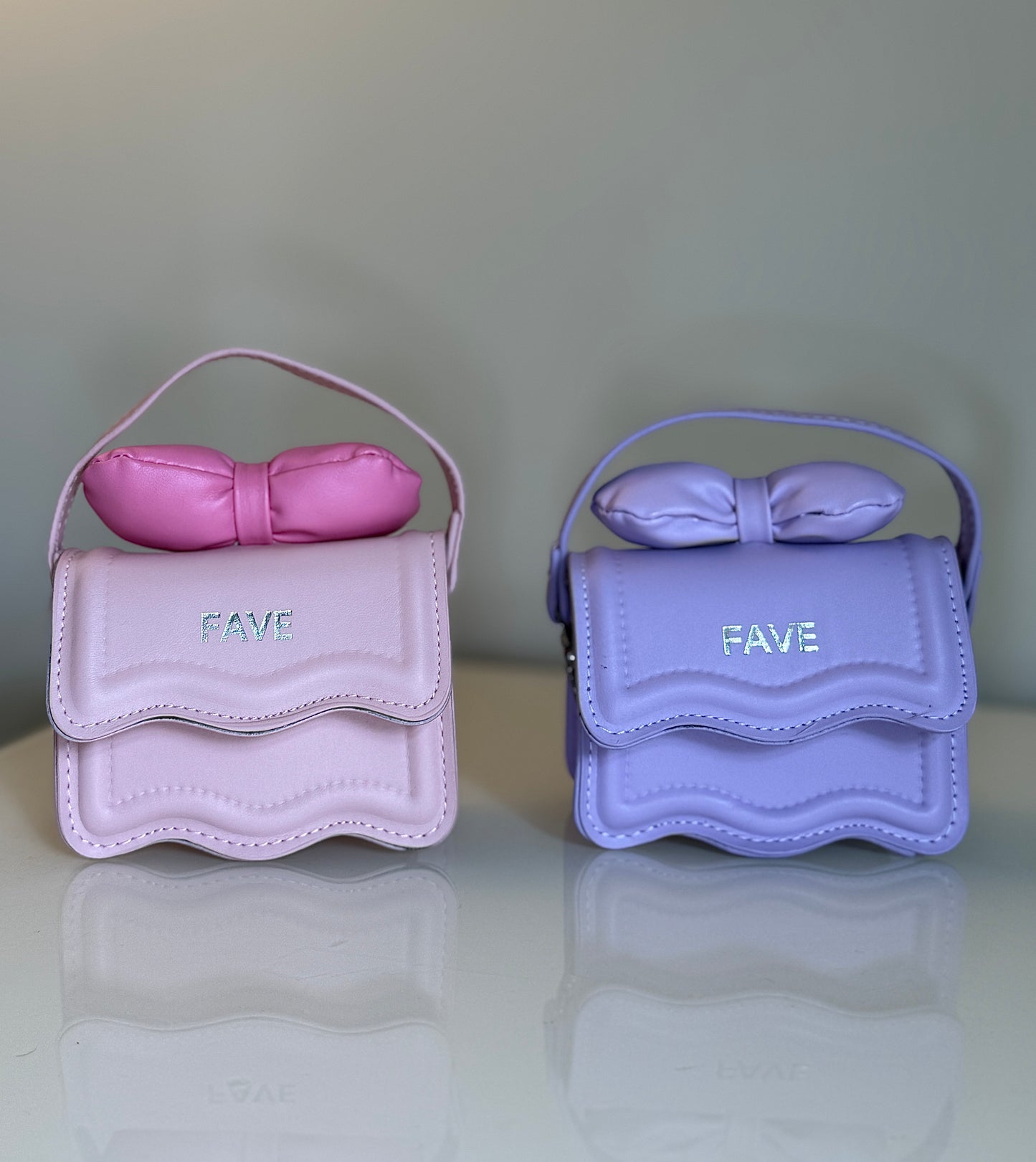 Mini handbag “FAVE” with bow