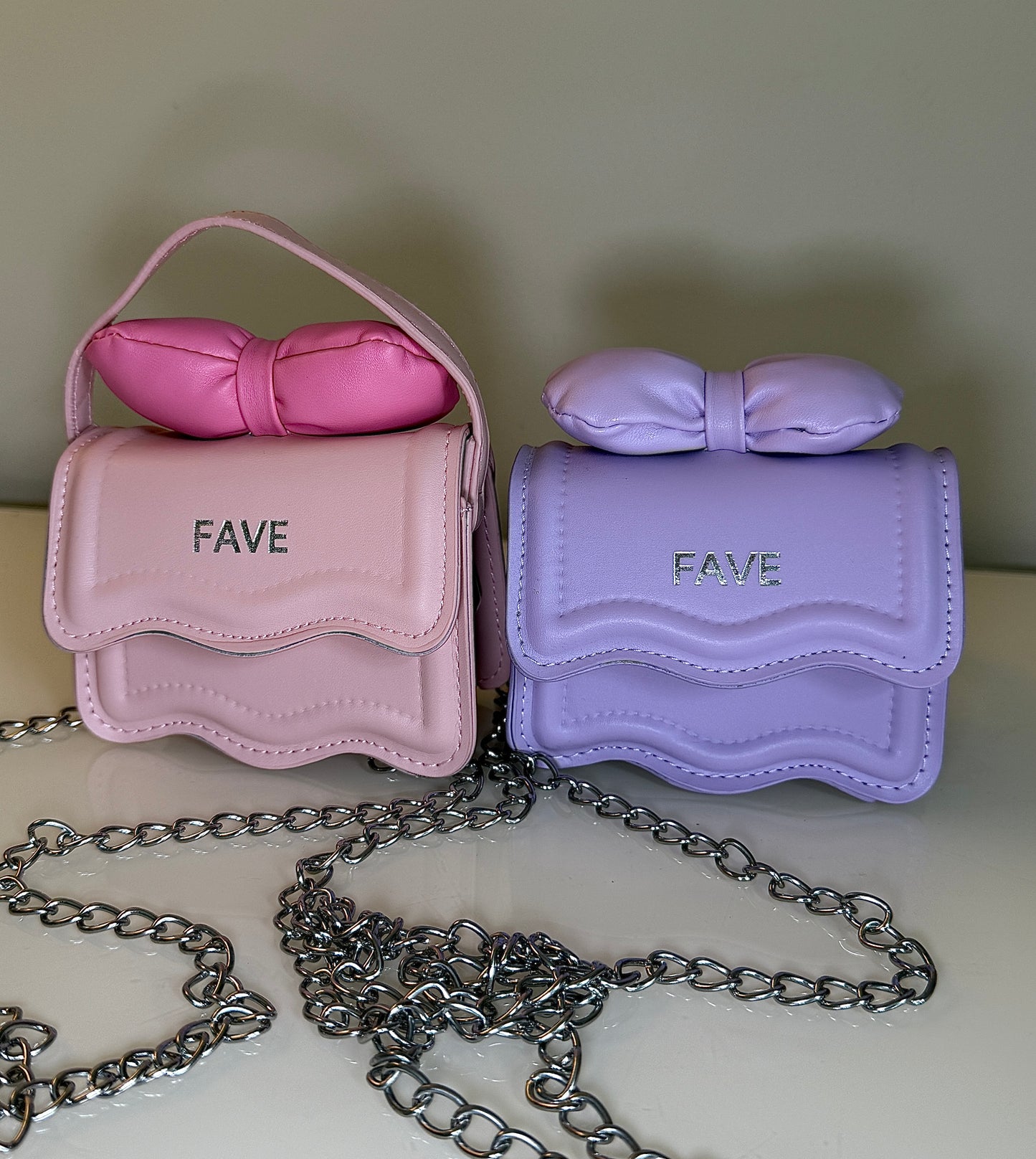 Mini handbag “FAVE” with bow